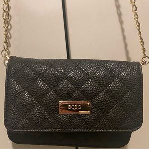 Black quilted bag with silver chain